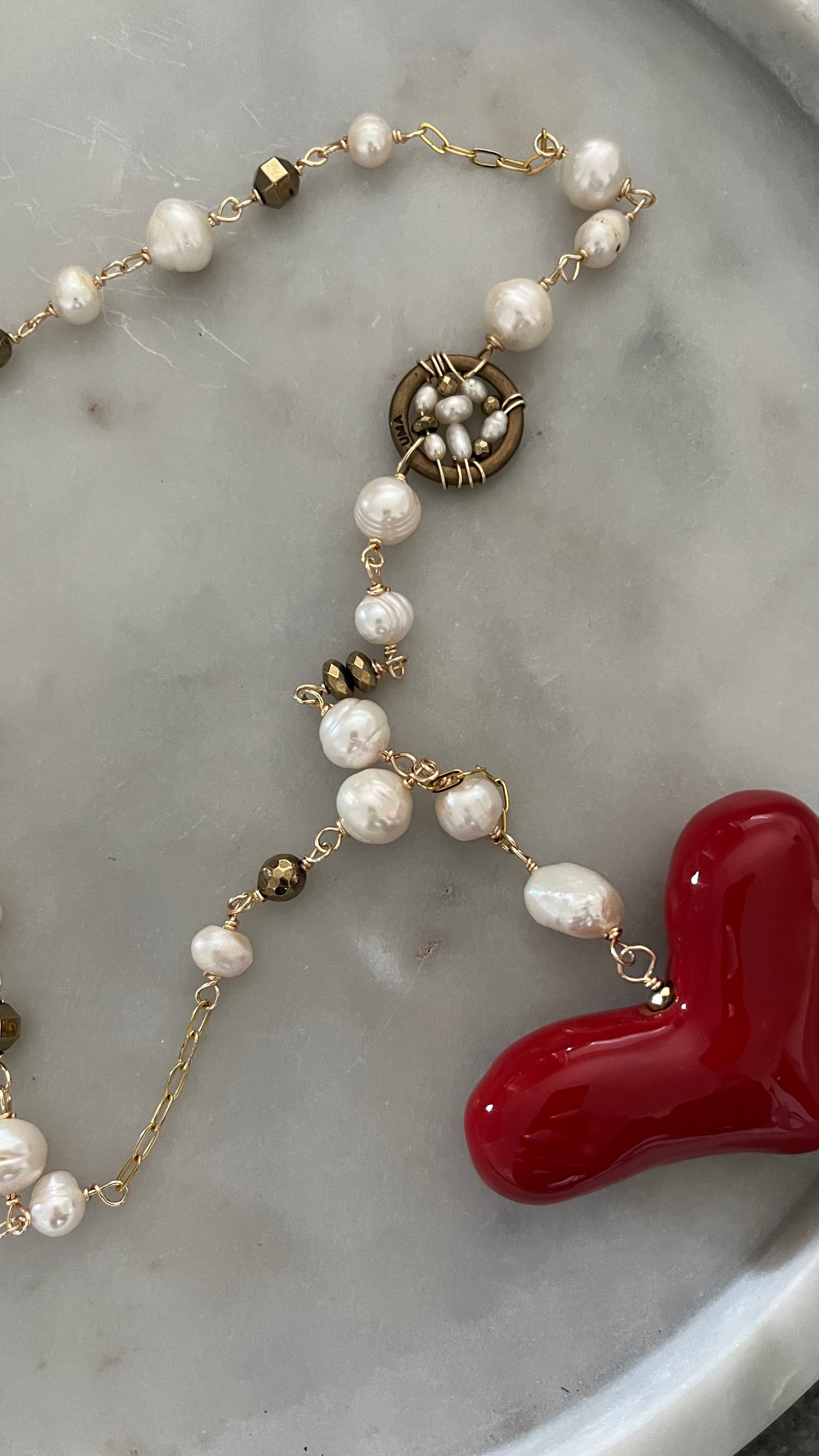 Collar de perlas con atrapa sueños