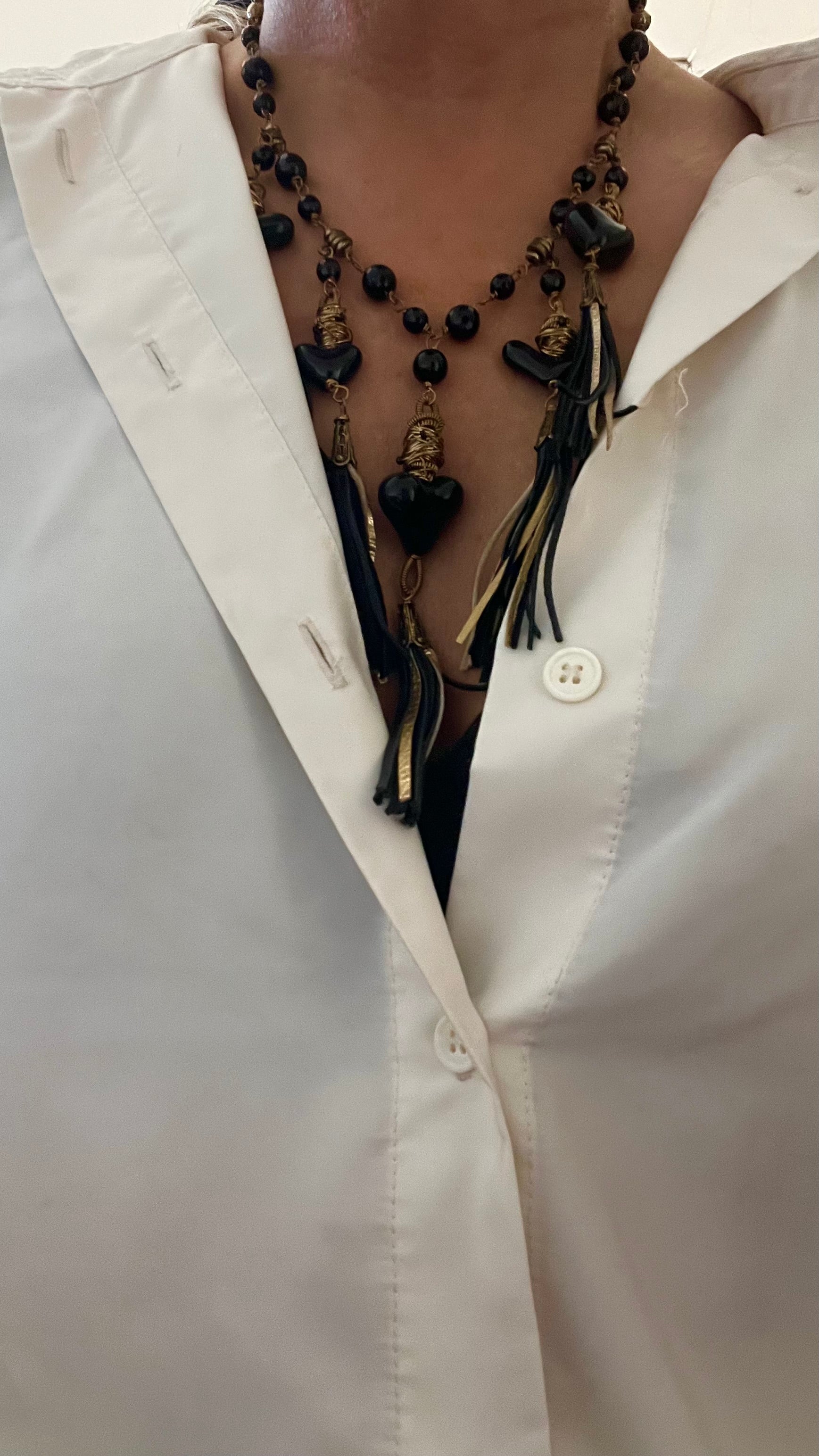 Collar de corazones y borlas