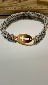 Pulsera elasticada cruz calada